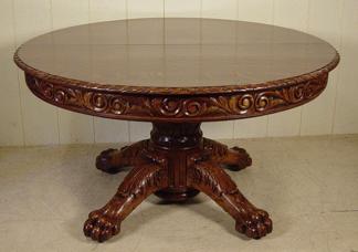 54" Round Oak Table with Carved Top & Apron w/ 4 leaves