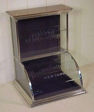 ELECTRIC RAZORS AND STROPS DISPLAY CABINET