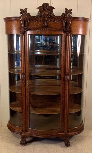 Curved Glass Oak China Cabinet wth Carved Lady's Head and Griffins