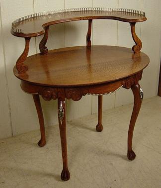 Unusual Oak 2-tier Oval Claw Foot Table