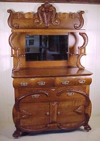 CARVED OAK SIDEBOARD