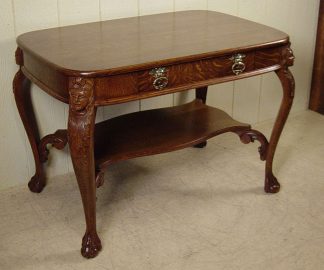 Oak Library Table with carved women's heads