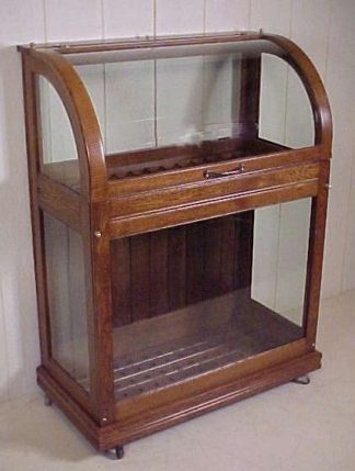 OSCAR ONKEN CO. OAK CANE DISPLAY CASE