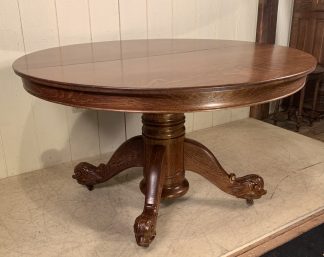 52" Round Oak Dining Table with 4 Leaves & Carved Dolphin feet