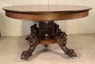 54" Round Oak Lion Head Claw Foot Table with 4 original leaves