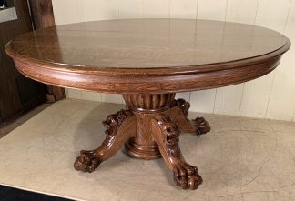 54" Round Oak Hastings Table Co. Lion Head Dining Table with 5 original leaves