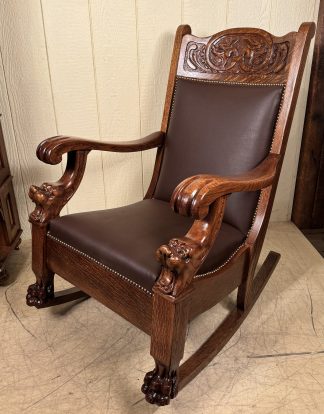 Carved Oak Rocker with Lion Heads
