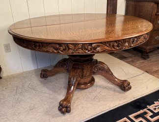 54" Round Oak Claw foot Dining Table with carved apron