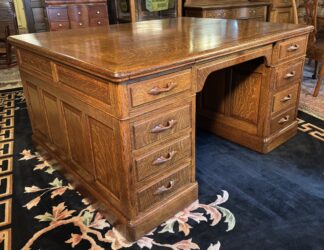 Large Oak Raised Panel Partner's Desk , signed "T.G. Sellew, New York"