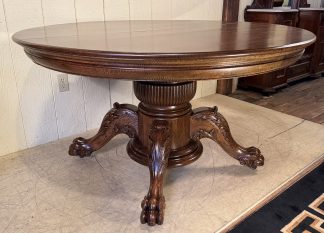 54" Round Oak Dining Table with 6 original leaves