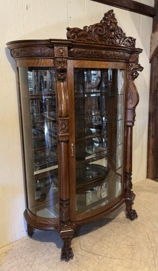Oak Curved Glass China Cabinet with Lion Heads