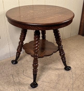 Great Round Oak Lamp Table with cast spoon shaped feet