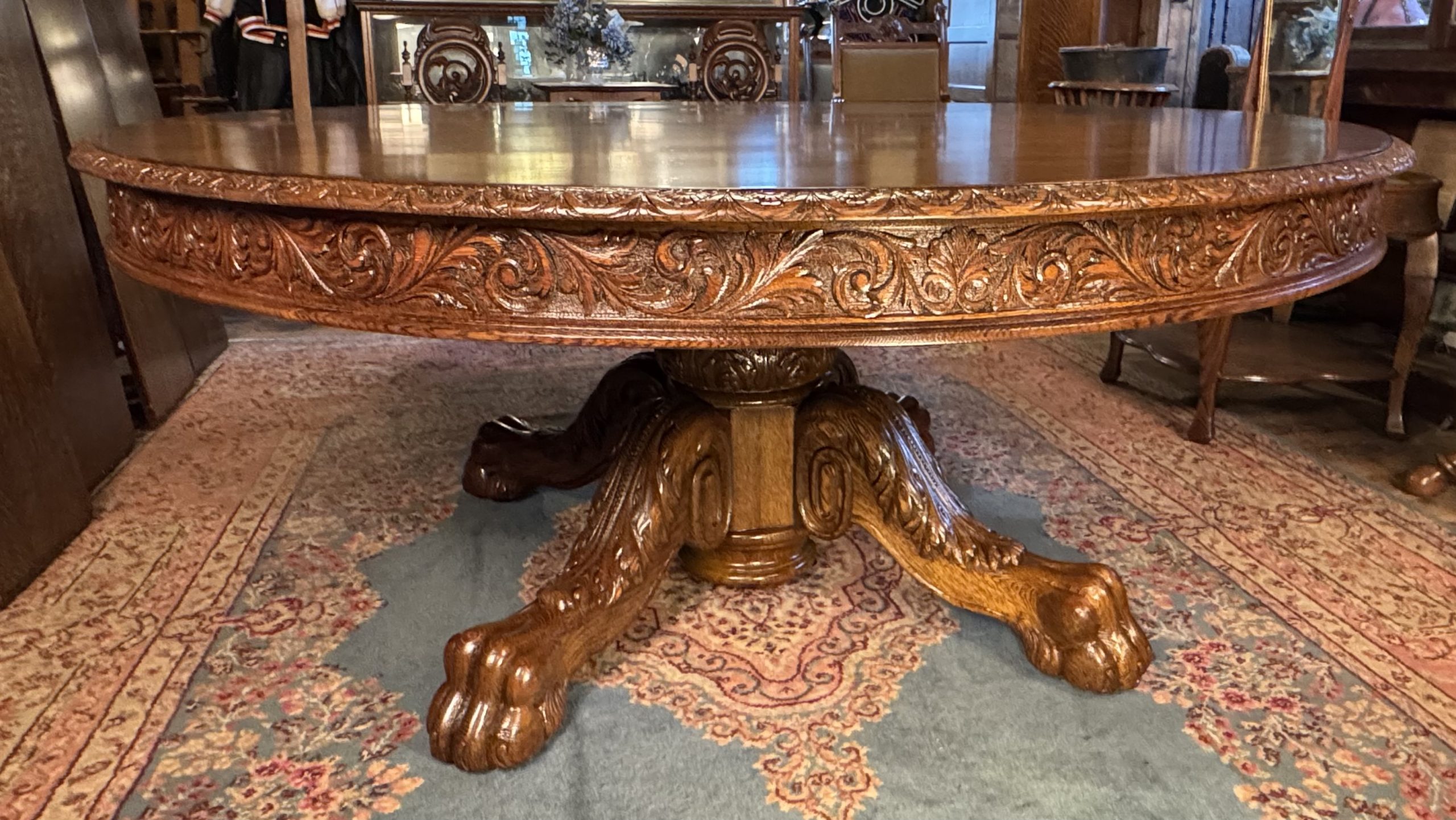 Large 70" Round Oak Claw Foot Dining Table with 7 original 14" leaves - Image 4