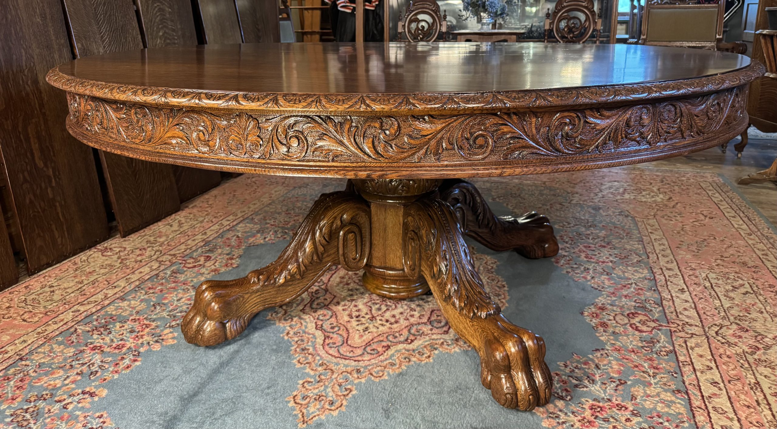 Large 70" Round Oak Claw Foot Dining Table with 7 original 14" leaves