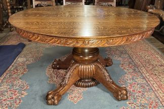 54" Round Oak Claw Foot Dining Table with 6 leaves