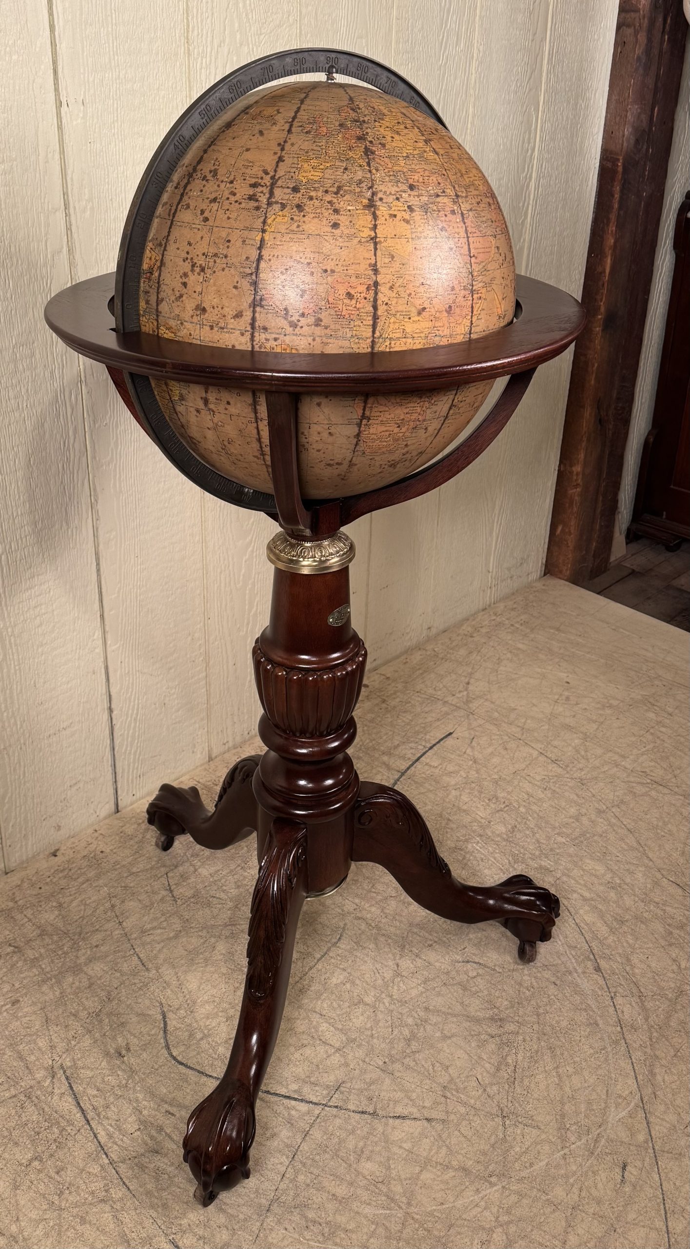 Antique World Globe on Mahogany Claw Foot Base