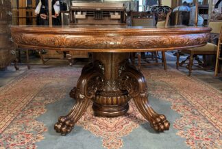 Exceptional 60" Round Oak Dining Table with Carved Apron & 5 original leaves