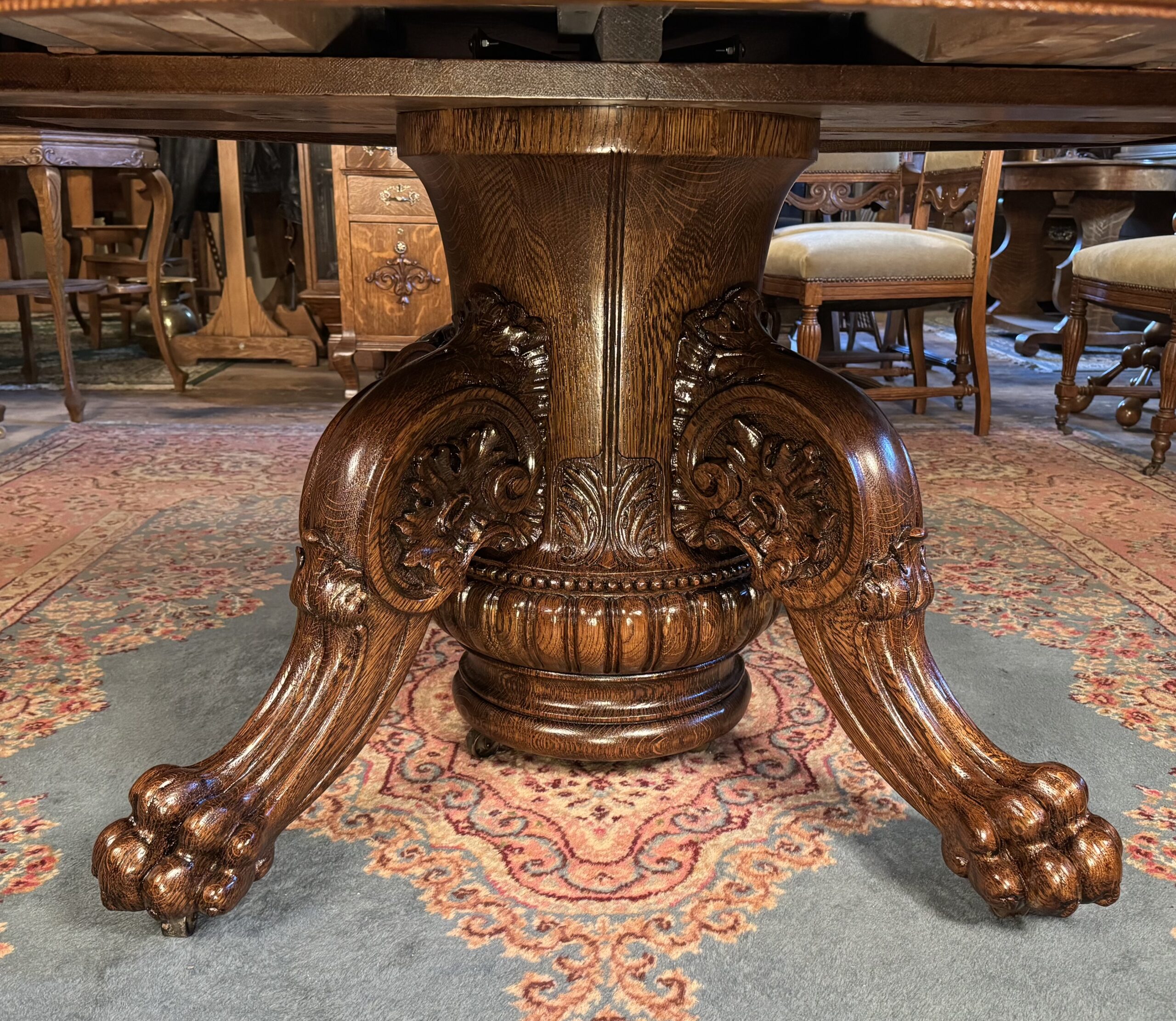 Exceptional 60" Round Oak Dining Table with Carved Apron & 5 original leaves - Image 4