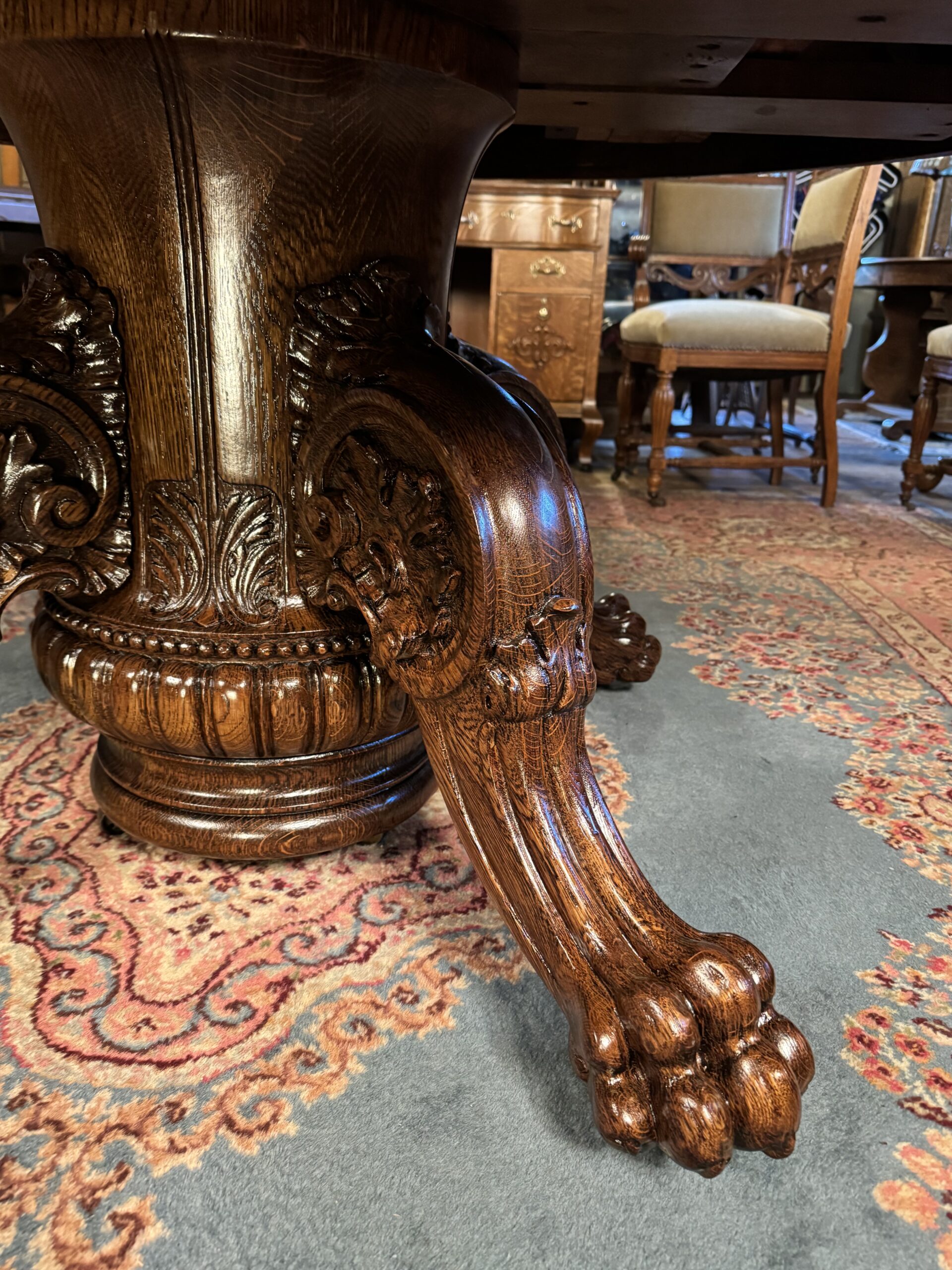 Exceptional 60" Round Oak Dining Table with Carved Apron & 5 original leaves - Image 5