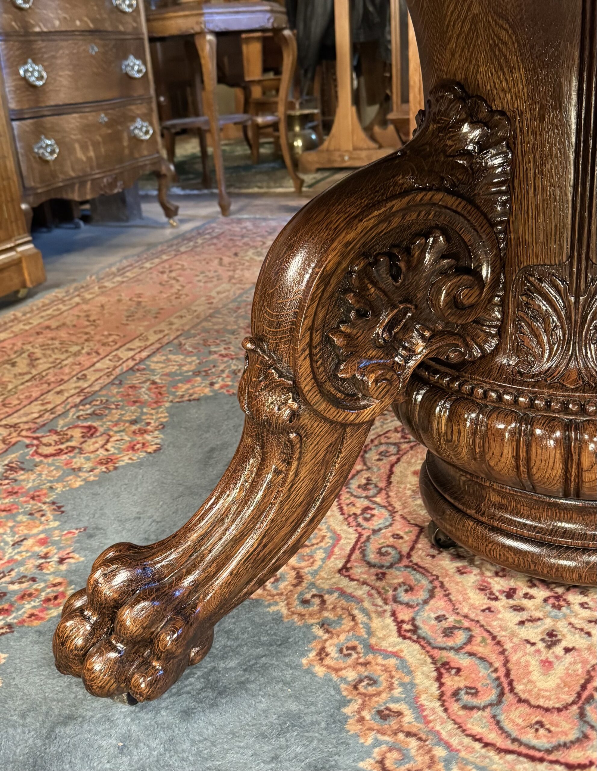Exceptional 60" Round Oak Dining Table with Carved Apron & 5 original leaves - Image 6