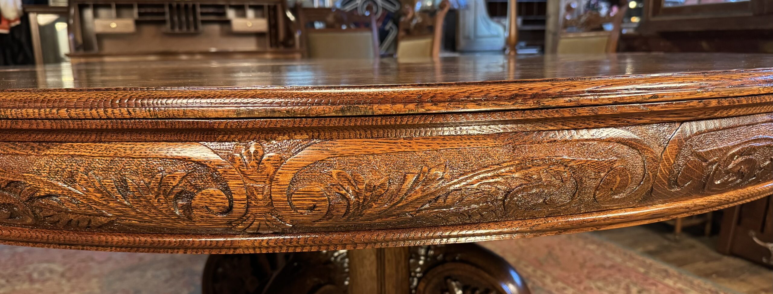 Exceptional 60" Round Oak Dining Table with Carved Apron & 5 original leaves - Image 8