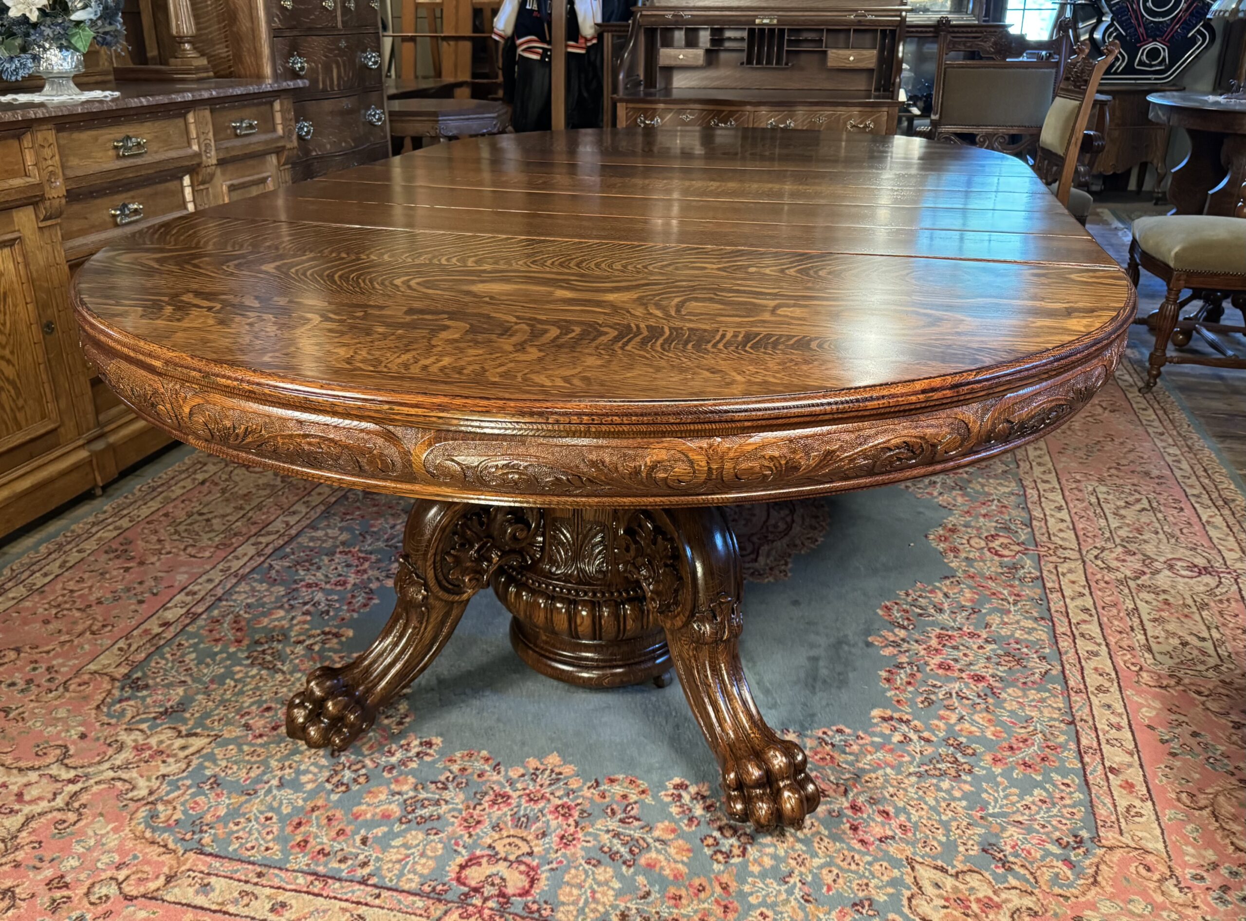 Exceptional 60" Round Oak Dining Table with Carved Apron & 5 original leaves - Image 10