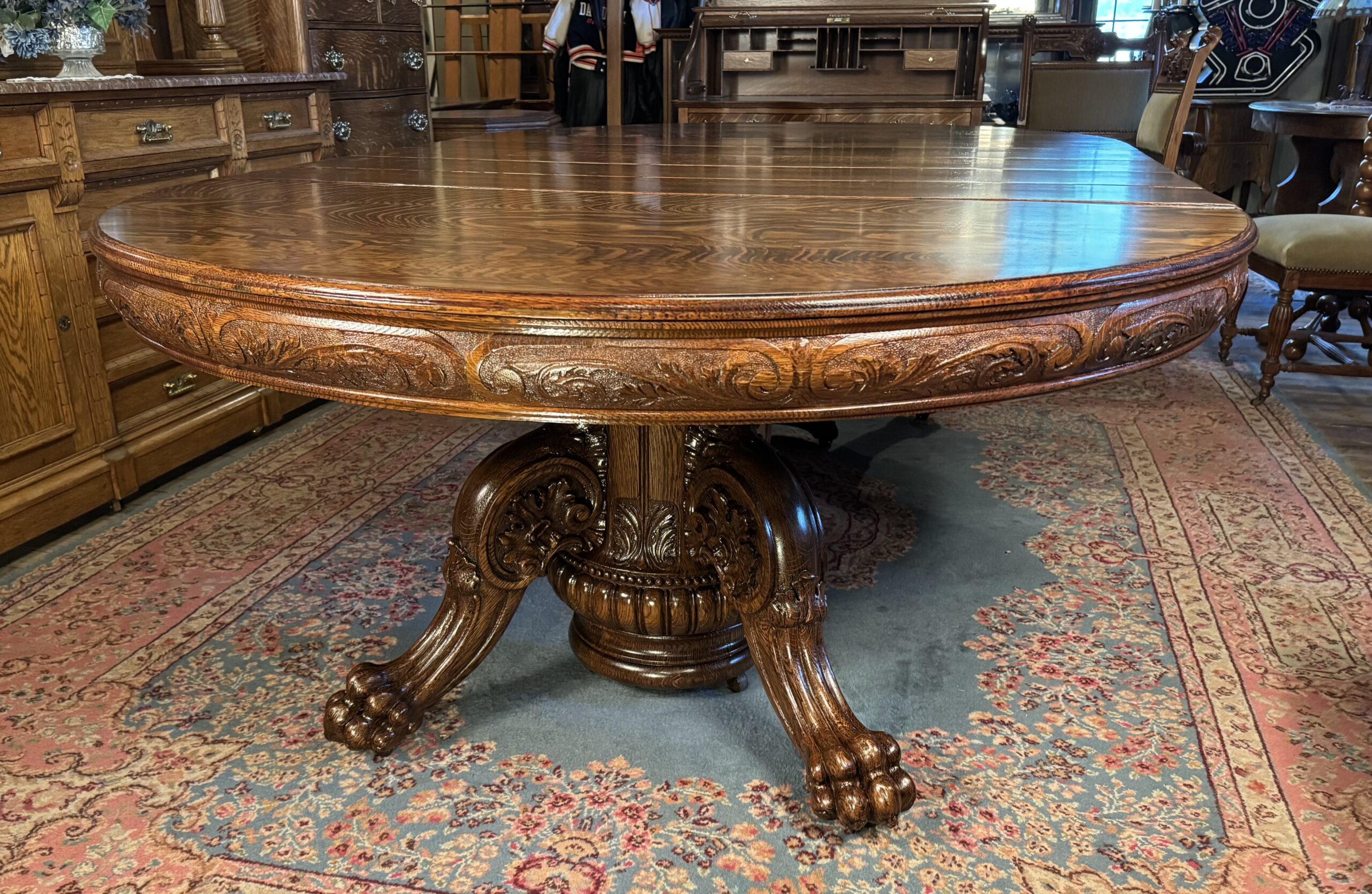 Exceptional 60" Round Oak Dining Table with Carved Apron & 5 original leaves - Image 11