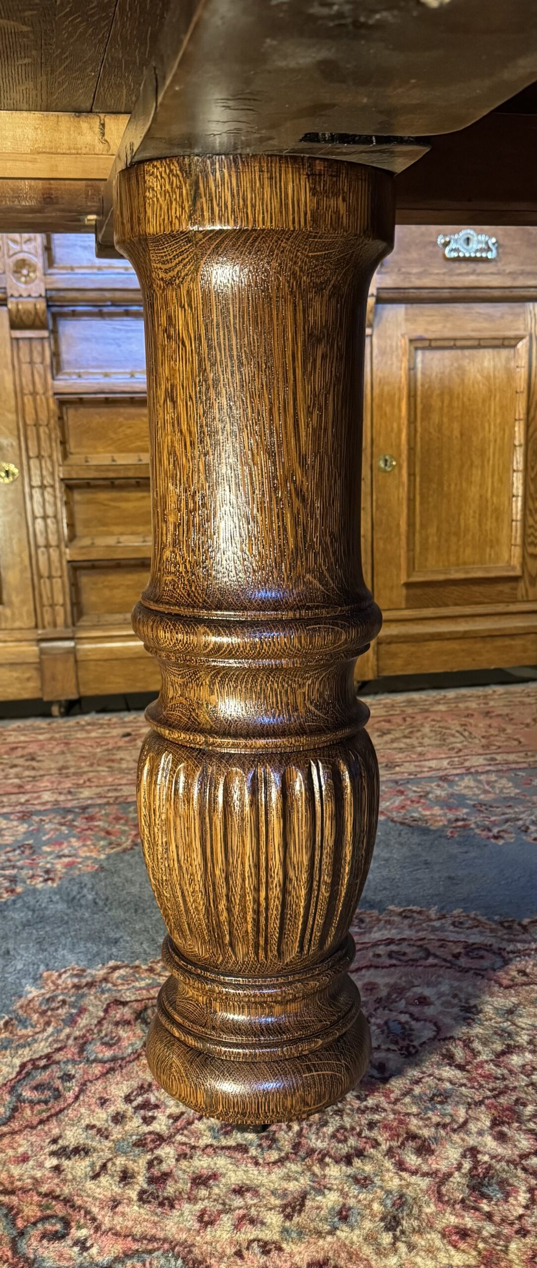 Exceptional 60" Round Oak Dining Table with Carved Apron & 5 original leaves - Image 13