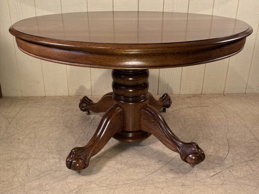 48" Round Hastings Table Co. Oak Table with 5 original leaves