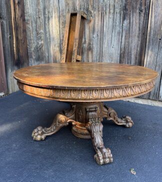 54" Round Oak Claw foot Dining Table with 4 leaves