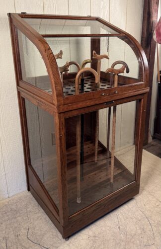 H. Pauk & Sons Mfg. Co. Curved Glass Cane Display Case